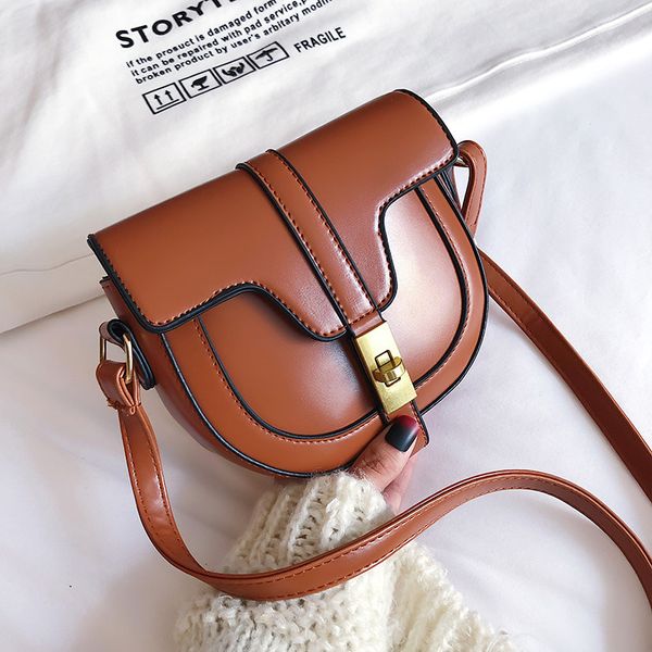 

net red female bag 2020 new niche fashion semicircle saddle bag small female crossbody retro lock shoulder