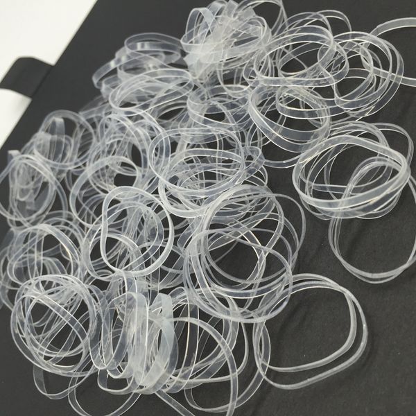 DHL Free 10000pcs Trasparente trasparente TPU Ponytail Holder Elastico Elastico per capelli Cravatte Corde Anelli Gomma elastica Utile Copricapo unisex