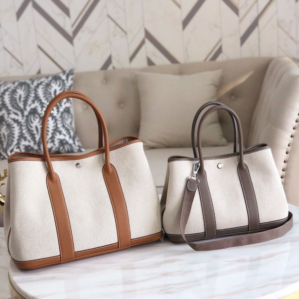 

wholesale orginal design leather +cavas purse,size 30cm,37cm brand totes,designed purse,made by calf, lamb skin,crocodile skin,fast delivery