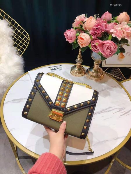 

new fund of rivet inclined genuine leather handbag shoulder chain cowhide envelope bag fashion female package