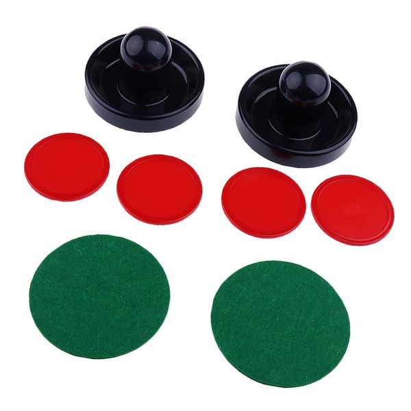 

pack of two air hockey pushers strikers goalies and four pucks three sizes