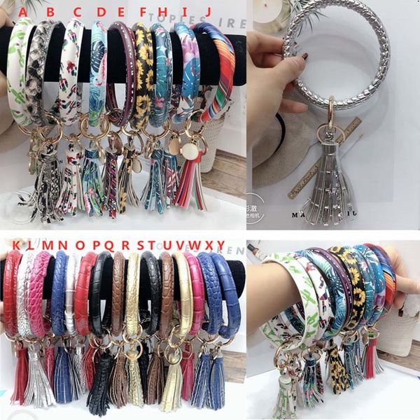 

24 стилей красочной кожи pu o key chain пользовательского круг кисточкой wristlet браслет брелок браслет брелок девушка женщины брелок ремеш