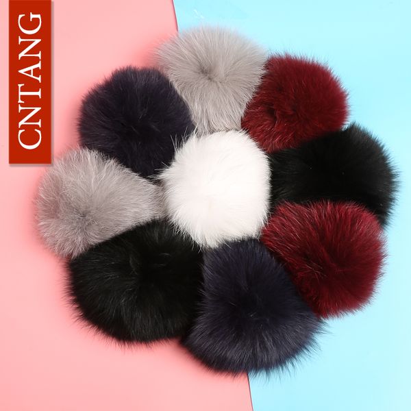 

cntang 15cm real raccoon fur fluffy pompoms 100% natural genuine fur pom pom cap women winter hats accessories high quality