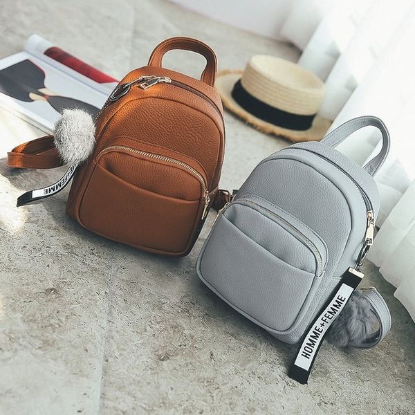 

backpack female korean version of the new female bag retro wild small backpack fashion mini fur ball student school bag