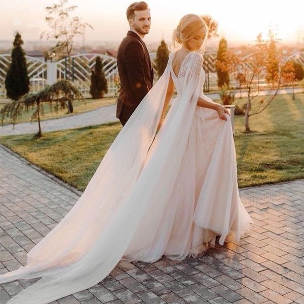 Discount 2020 Romantic Beach Wedding Dresses Cap Sleeve Illusion A Line Lace Appliques Princess Bride Dress Arabic Wedding Gown With Pearl Simple
