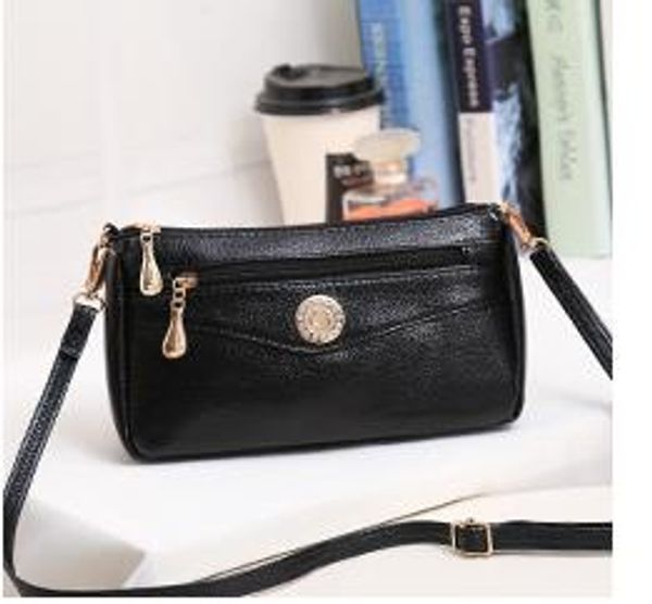 

designer women's bag 2020 new fashion luxury shoulder handbag casual trendy small square bag designer coin decoration crossbody bag