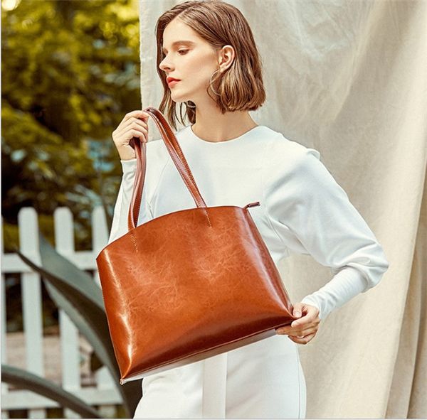 

2020 новый портативный моды тотализатор женская сумка бесплатно shippin европейский и американский стиль кожаный мешок весной и летом атмосф