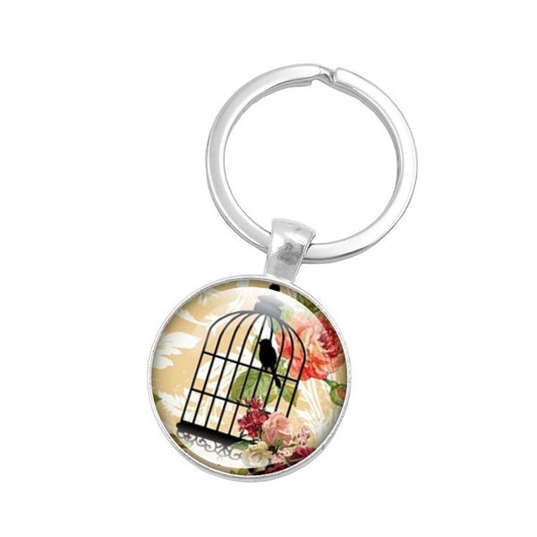 Acheter 2019 Nouveau Porte Clés En Cristal De Cage à Oiseaux Porte Clés Pendentif En Verre Cabochon Canari Dans Le Porte Clés En Alliage Image Cage