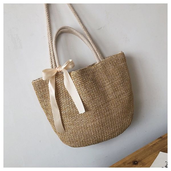 

2019 straw big bag lady one-shoulder hand-held slash bucket bag large-capacity beach shopping