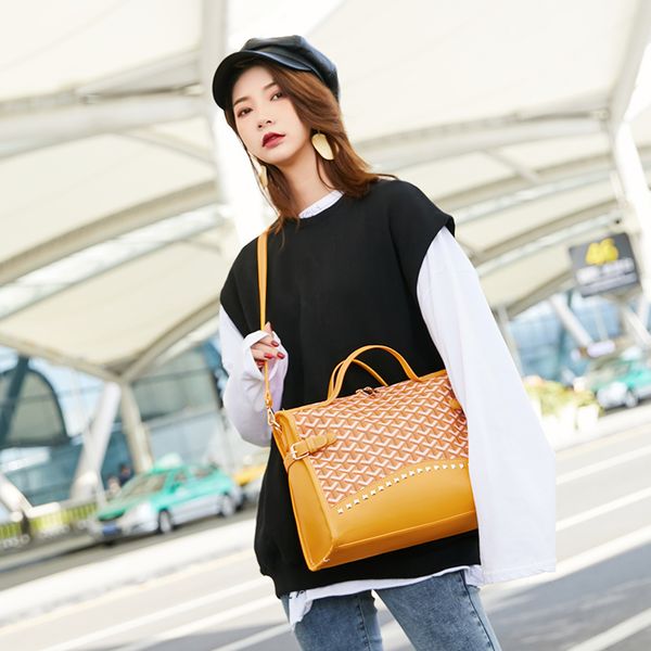 

dog tooth bag south korea dongdaemun women's bag new 2019 autumn and winter slant large capacity rivet motorcycle handbag