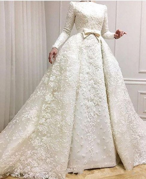 2019 Modest Vestidos de Casamento Muçulmanos Mangas Compridas Lace Appliqued Frisado Vestidos de Noiva com Overskirts Plus Size Wedding Gowns228z