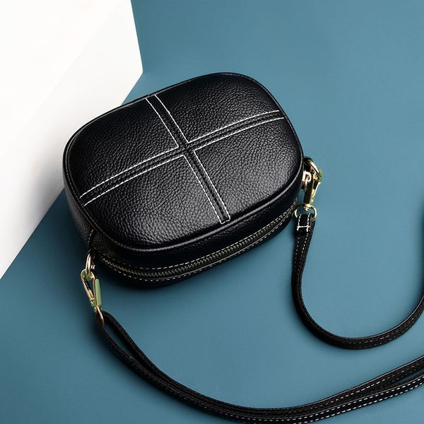 

2020 new ladies shoulder bag pu messenger bag fashion trend small round pure color soft leather women
