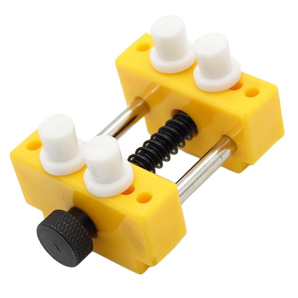 

watchmaker repair tools to disassemble the watch case tool to hold the watch