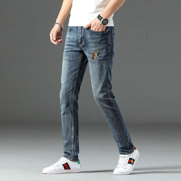 

spring and summer new elastic badge jeans men's tide brand slim men's thin blue jeans male feet pants