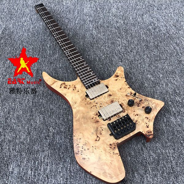 

in stock eart headless electric guitar, charcoal grilled maple 5 neck, stainless steel wire, ash body rotten wood grain,i