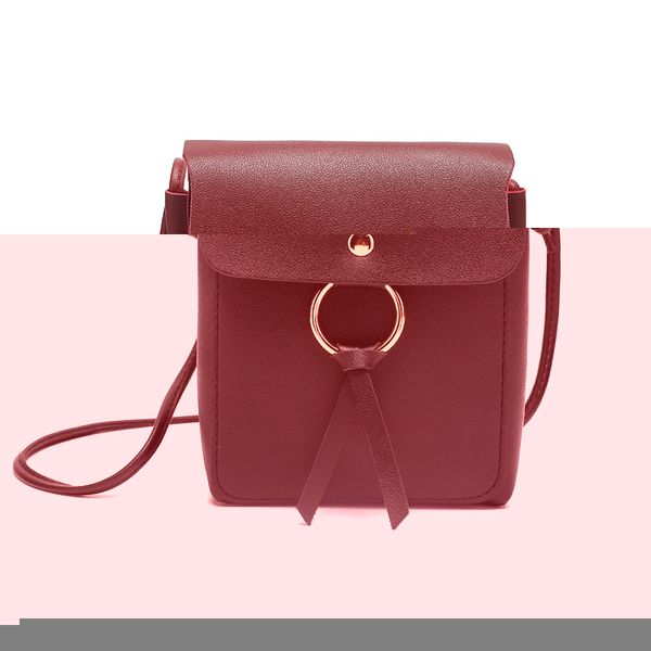 

2018 new women's shoulder bag pu material girl fashion casual tassel mini purse crossbody bag solid colour small bags