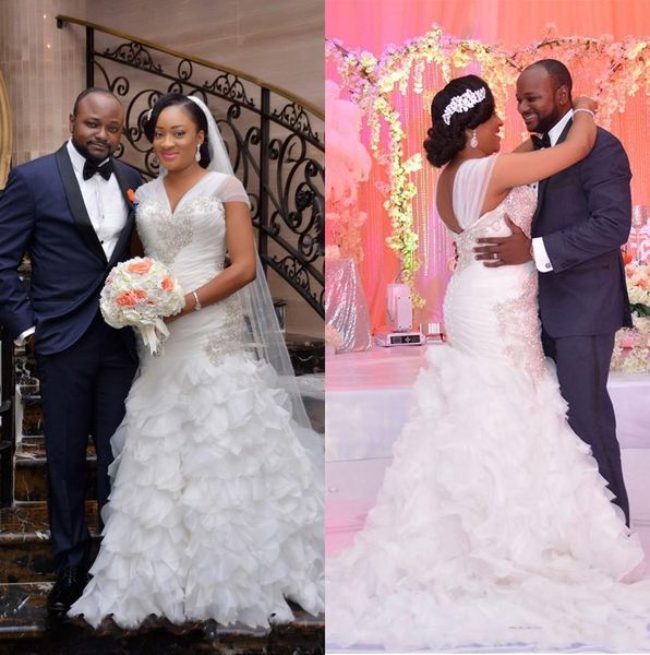 

2020 african mermaid wedding dresses v neck cap sleeves lace applique beaded ruffles tiered organza sweep train plus size wedding gowns, White