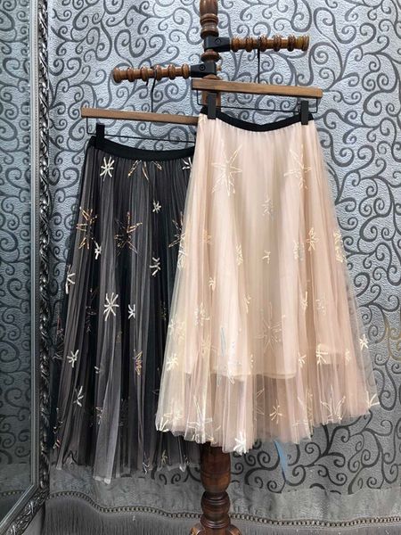 

2020 new women early spring sequins decorative stitching pattern models wild long skirts 107, Black