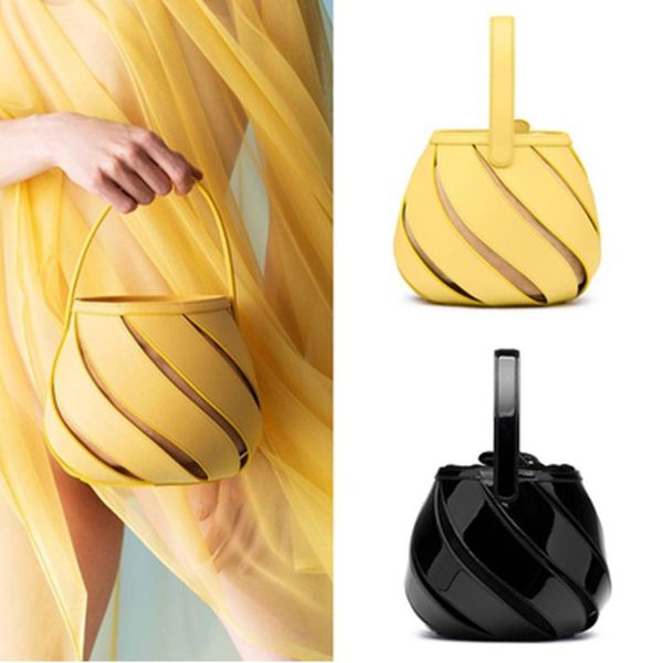 

2019 new tide solid color hollow pu material small fairy bag portable bucket bag casual wild single shoulder messenger