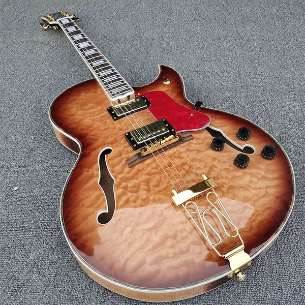 

hollow jazz electric guitar, big flower decoration, tiger stripes on the back, colorful abalone binding gold hardware, sh