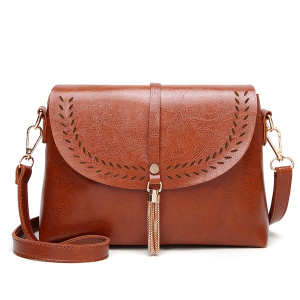 

2020 women's shoulder bag tide slant cross women's bag hollow fringe small