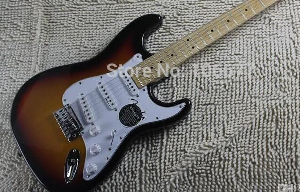 

standard sunburst electric guitar tremolo signature on headstock strat