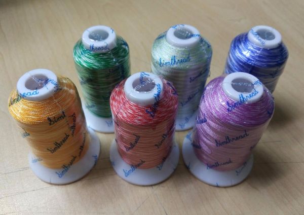 

yarn variegated embroidery machine thread 6 assorted colors, 100% viscose rayon for brother singer janome pfaff, Black;white