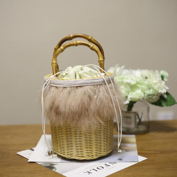 

bamboo handle pink fire feather willow rattan woven basket drum bag handbag bags