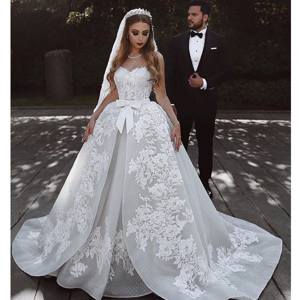 

2020 arabic ball gown wedding dresses sweetheart plus size lace appliques crystal open back sweep train bow plus size formal bridal gowns, White