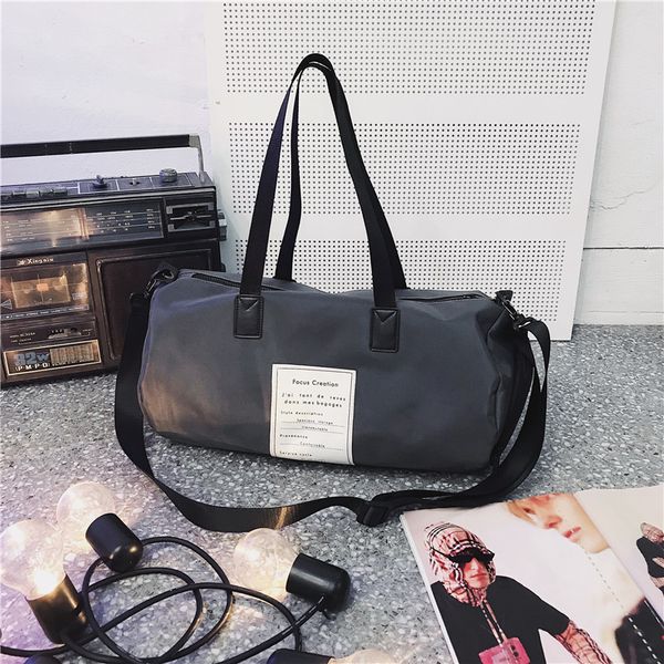 

brand women's bag 2019 sports fitness bag men's and women's yoga training cylinder large portable short-distance travel
