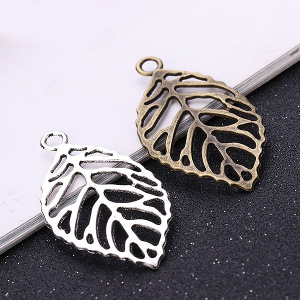 

60pcs / мешок ancient серебро бронза 49 * 27мм hollow листья подвески подвески дизайнер ювелирных изделий fit making ожерелье браслет аксесс, Bronze;silver