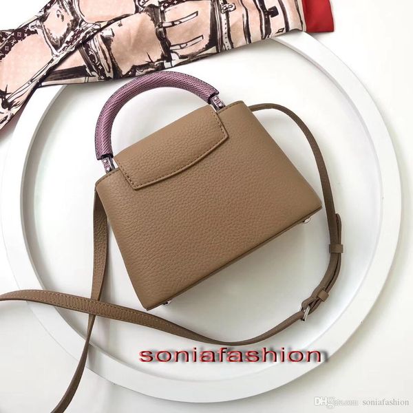 

new make of the fashion style woman bag genuine cowhide designer with special handle and long strap woman tote bag