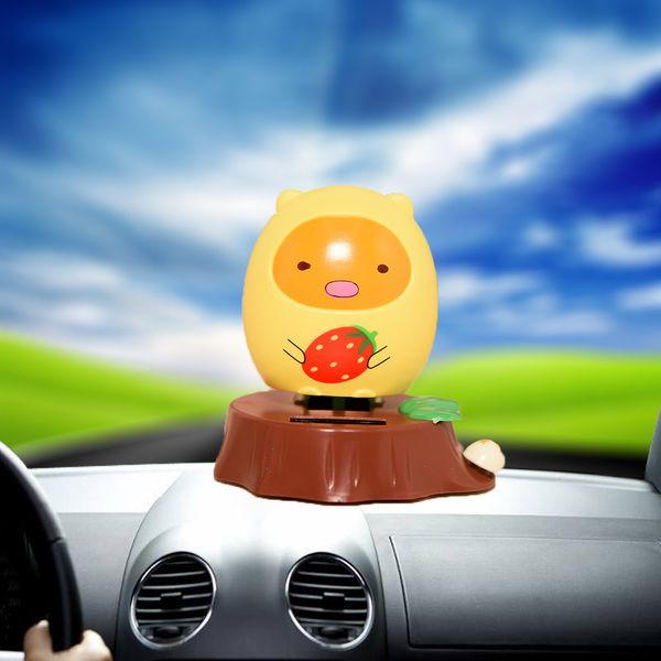 

car dashboard toy ornaments abs material creative solar automobile cartoon rice group shaking head doll decoration accessories