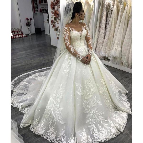 

stunning white/ivory ball gown abric wedding dresses jewel neck illusion sleeve appliques sequin wedding wear sweep train satin bridal dress