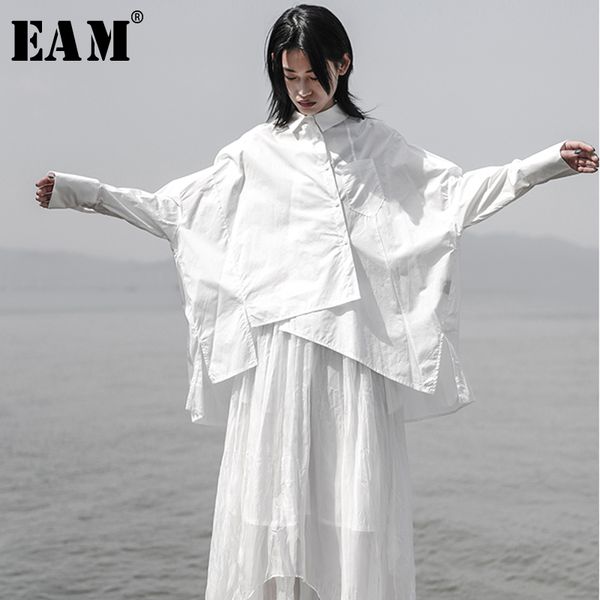 

eam] 2019 new autumn winter lapel long sleeve white loose oversize irregular loose shirt women blouse fashion tide js921