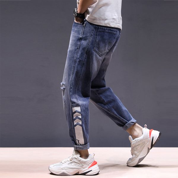 

fashion streetwear men jeans blue color loose fit harem pants small leg ripped jeans men printed designer hip hop hole