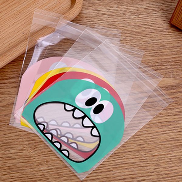 

100pcs cute cartoon monster cookie candy bag self adhesive plastic packing bag wedding party biscuits baking package supplies