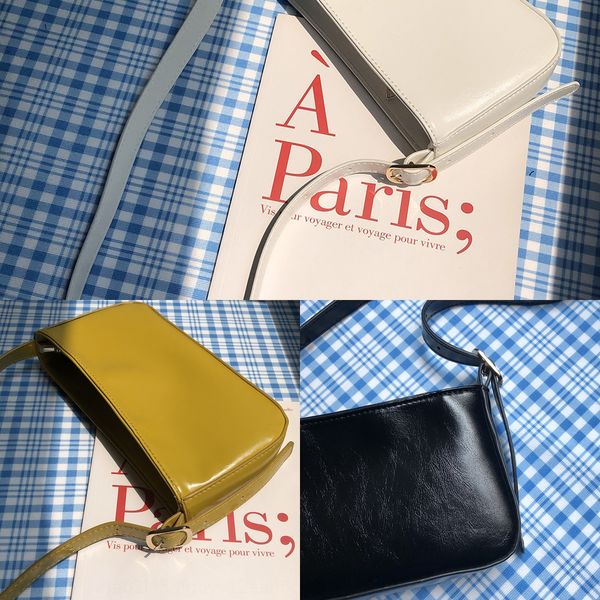 

guangzhou female 2020 french armpit ins niche design simple magic stick portable magic shoulder bag shoulder bag