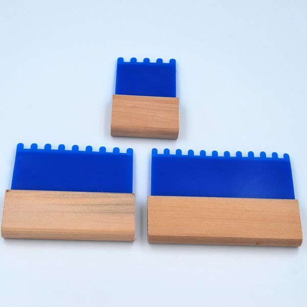 

plastic comb with round teeth for creating combing effect in paint & plaster, Silver