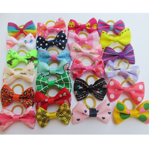 

40 шт. / лот случайный собака волос лук с резинкой горный хрусталь уход за домашними животными смешивания цветов различных моделей pet волос