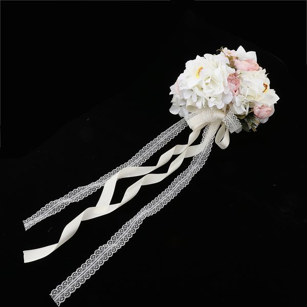 

romantic rose wedding bridal bouquet hand holding flowers- light pink