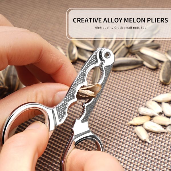 

премиум подсолнечник овощечистка плоскогубцы мелкого ореха шеллер шеллер орех цинковый сплав материал трещины кедровые орехи инструмент wh08