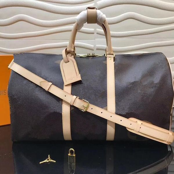 

2020 new travel bag large capacity genuine leather material hand luggage bag sports fitness bag duffle bags women travel bags hand luggage