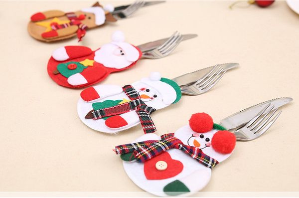 

1000pcs new christmas bag dinner table cutlery holder decoration for home snowman santa claus knife fork holder dhl