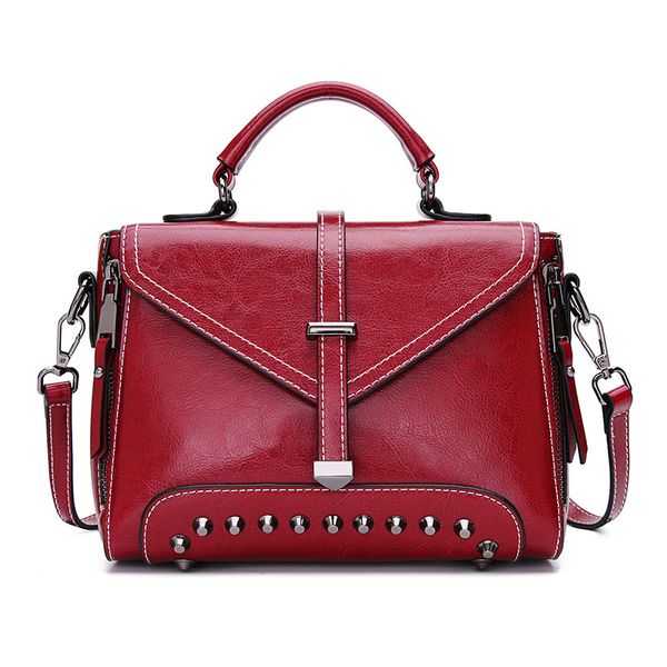 

2019 новый стиль мода коровьей rivet рук плеча мешок женщин кошельки и сумки