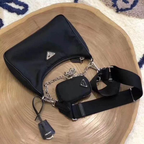 

мода черного цвета сумка для мужчин и женщины оптового новых продуктов креста тело нейлонового мешок с разменной монетой кошельком известной