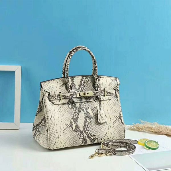 

2019 package snake cowhide hand bill of lading shoulder satchel package woman atmosphere genuine leather woman package