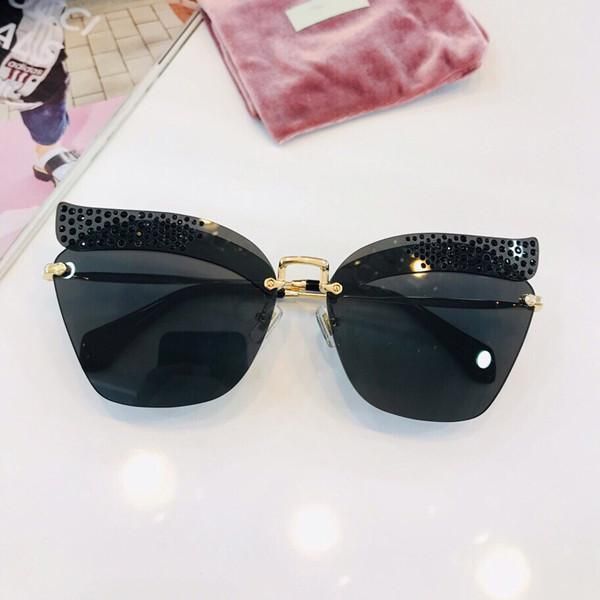 

new selling brand glasses smu56 frameless charming cat eye sunglasses for womens trend avant-garde style uv400 lens eyewear, White;black