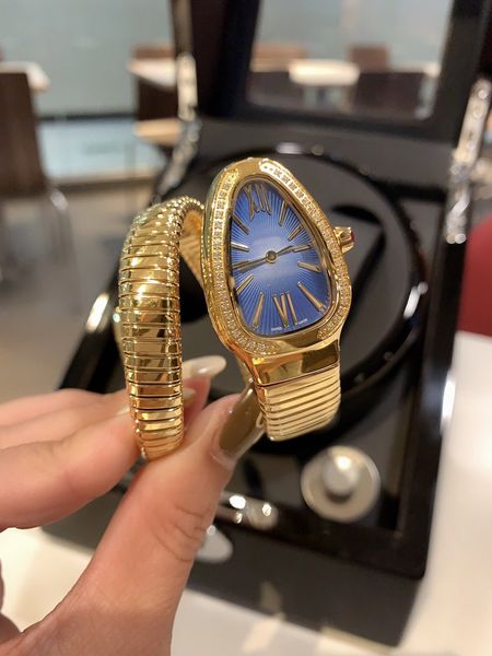 

wristwatches women watches quartz movement snake watch drill face clock simple and elegant, Slivery;golden