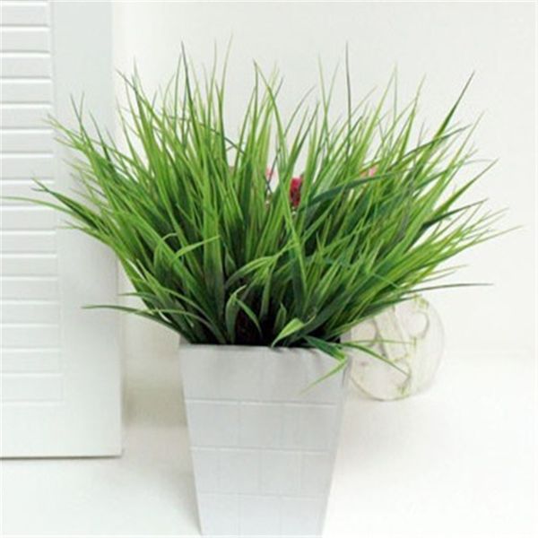 

deskartificial greenery plastic fake leaves shrubs bushes outside garden office verandah wedding decoration home grass